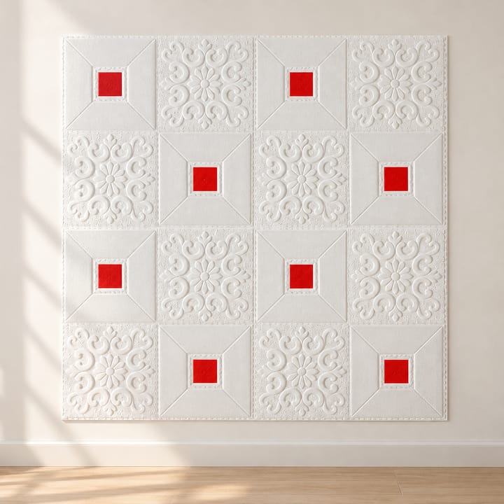 Embossed foam tile with red inset squares