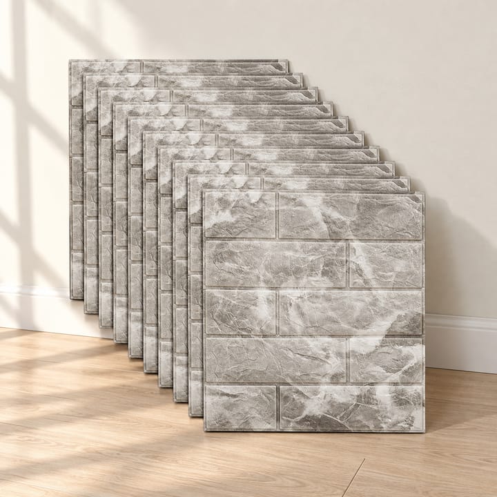 Stack of gray marble foam brick tiles with soft veining