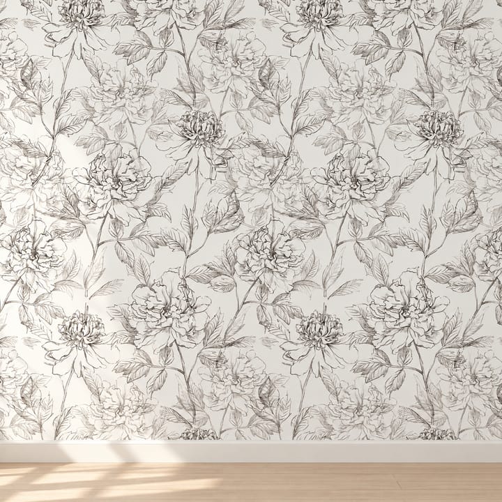 Peony garden line floral wallpaper behind a black bedpost and a bedside lamp