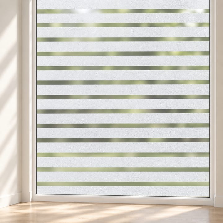 Close view of frosted stripe window film with narrow clear gaps