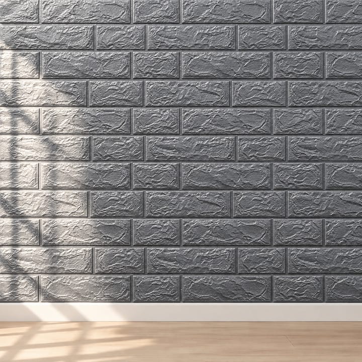 Stack of gray foam brick tiles