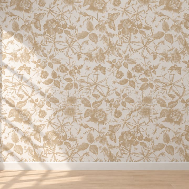 Champagne rose wallpaper around a white fireplace in a living room
