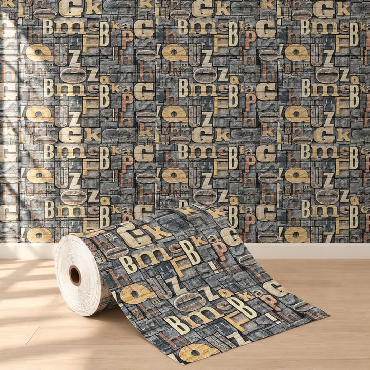 Letters foam brick roll printed with letter tiles on a dark ground